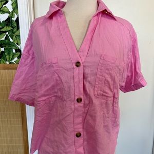 Women pink button down top with pockets
